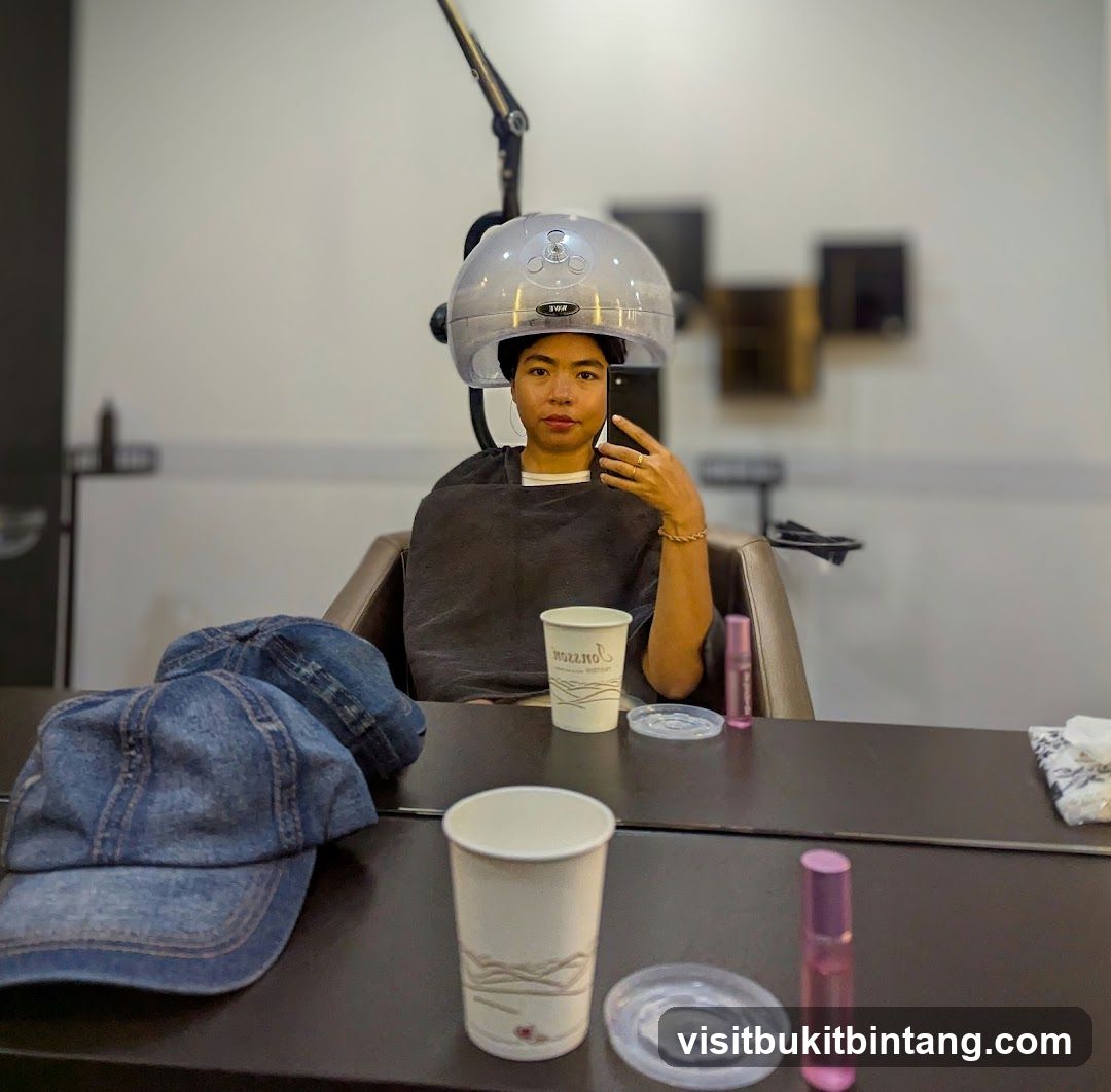 Woman under hair dryer
