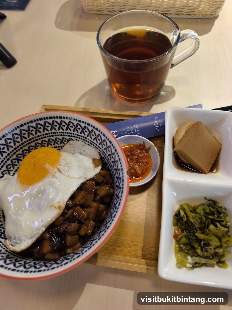Braised Pork Rice with Fried Egg and Tea
