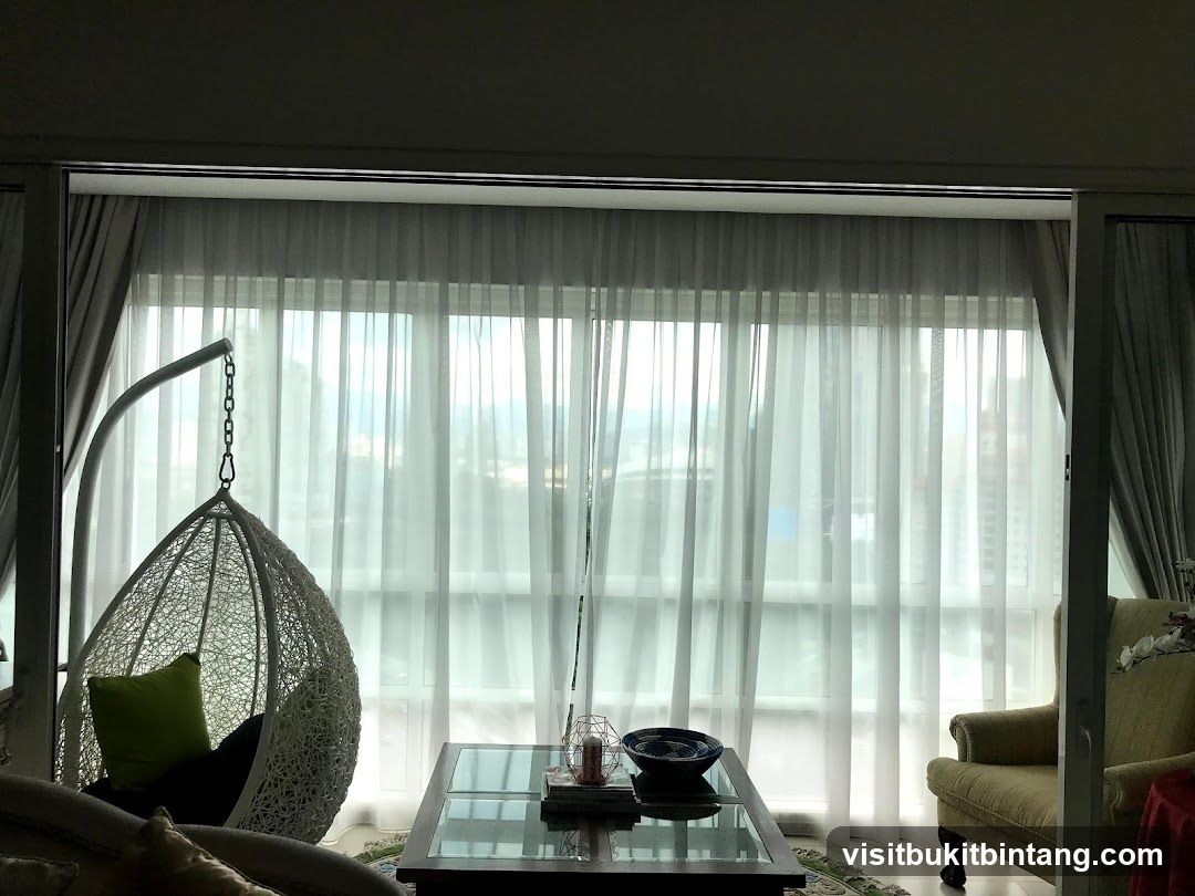 Living Room with Hanging Chair and Large Window