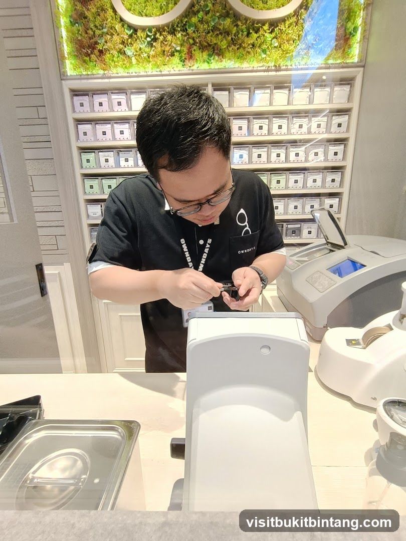 Optician working at counter