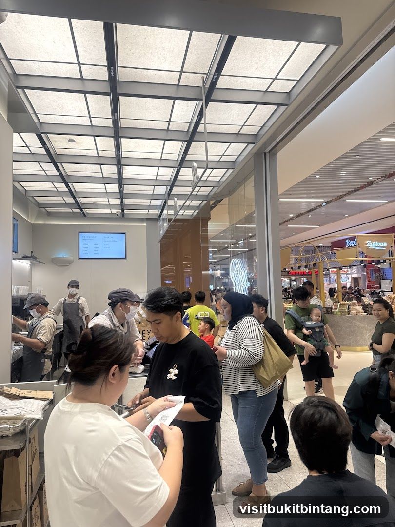 People queuing at a food establishment