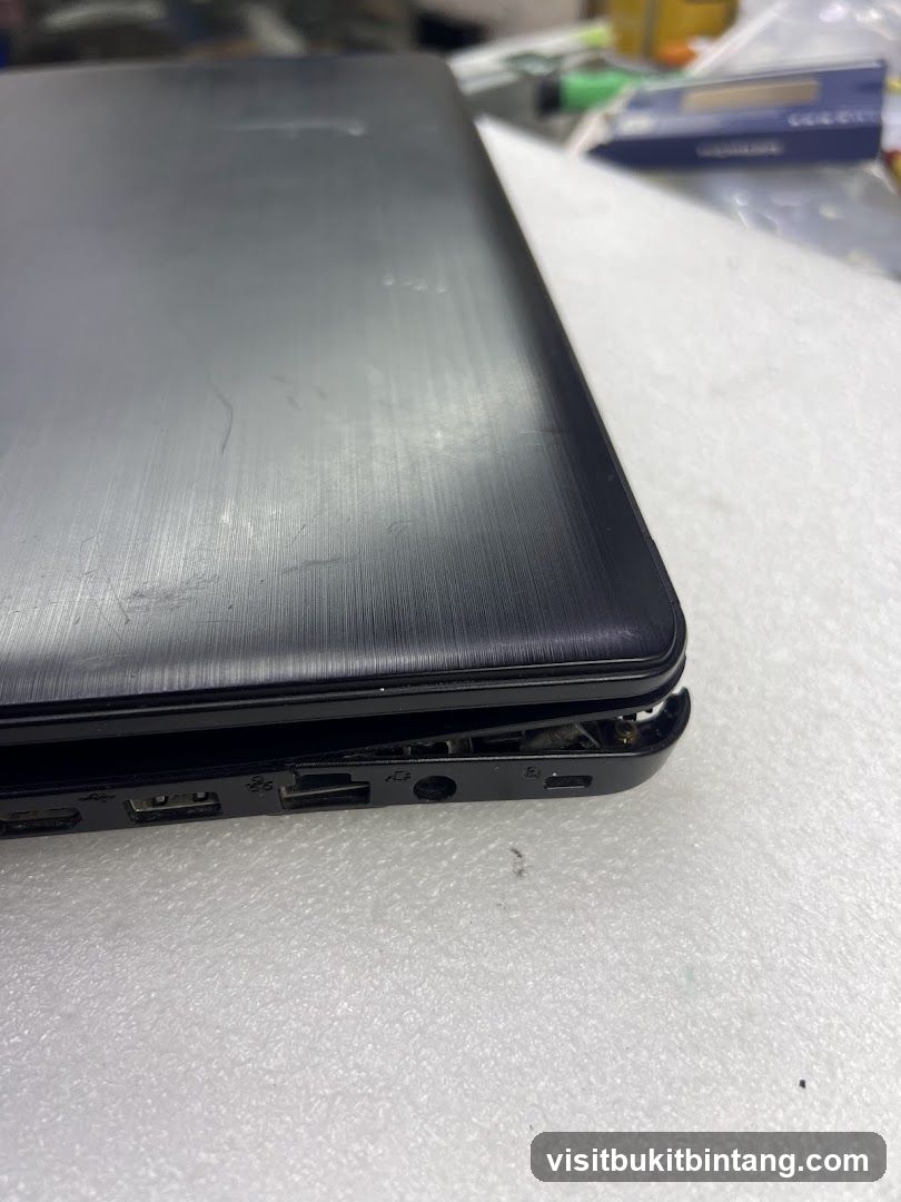 Damaged Laptop Side
