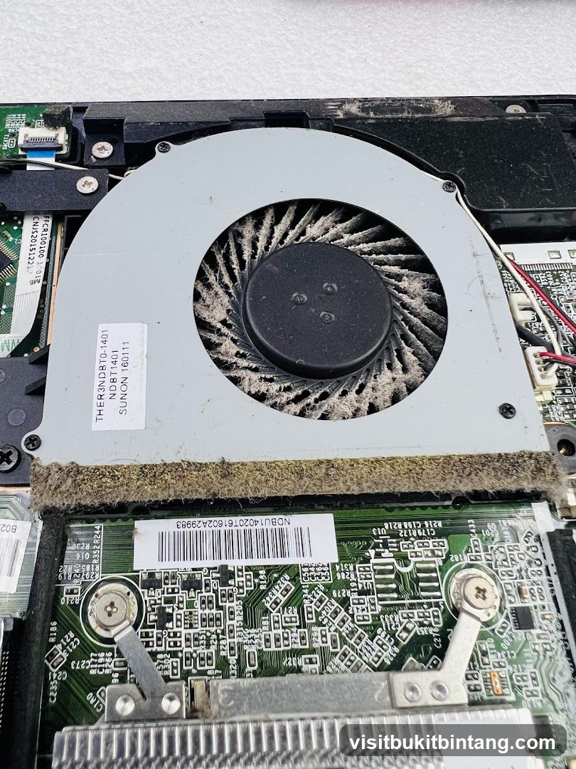 Dusty Laptop Fan and Motherboard
