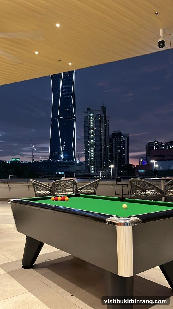 Rooftop Pool Table with City View at Dusk