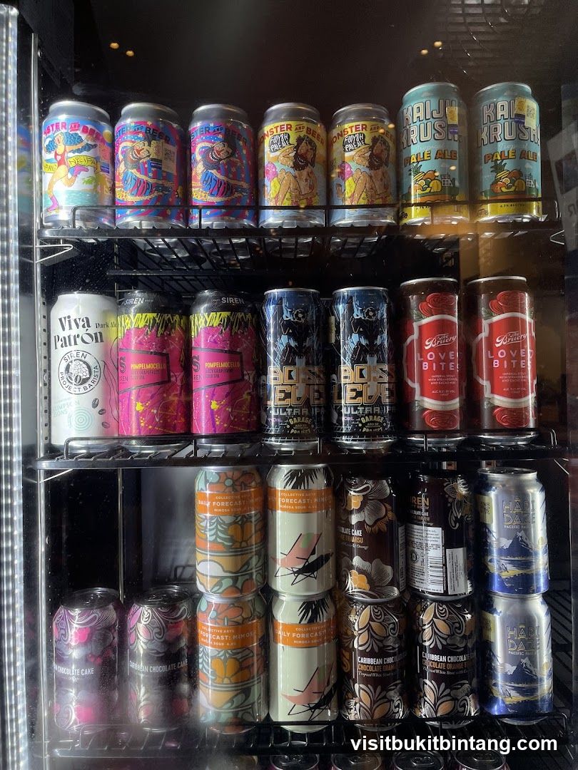 Cans of Beer in Refrigerator