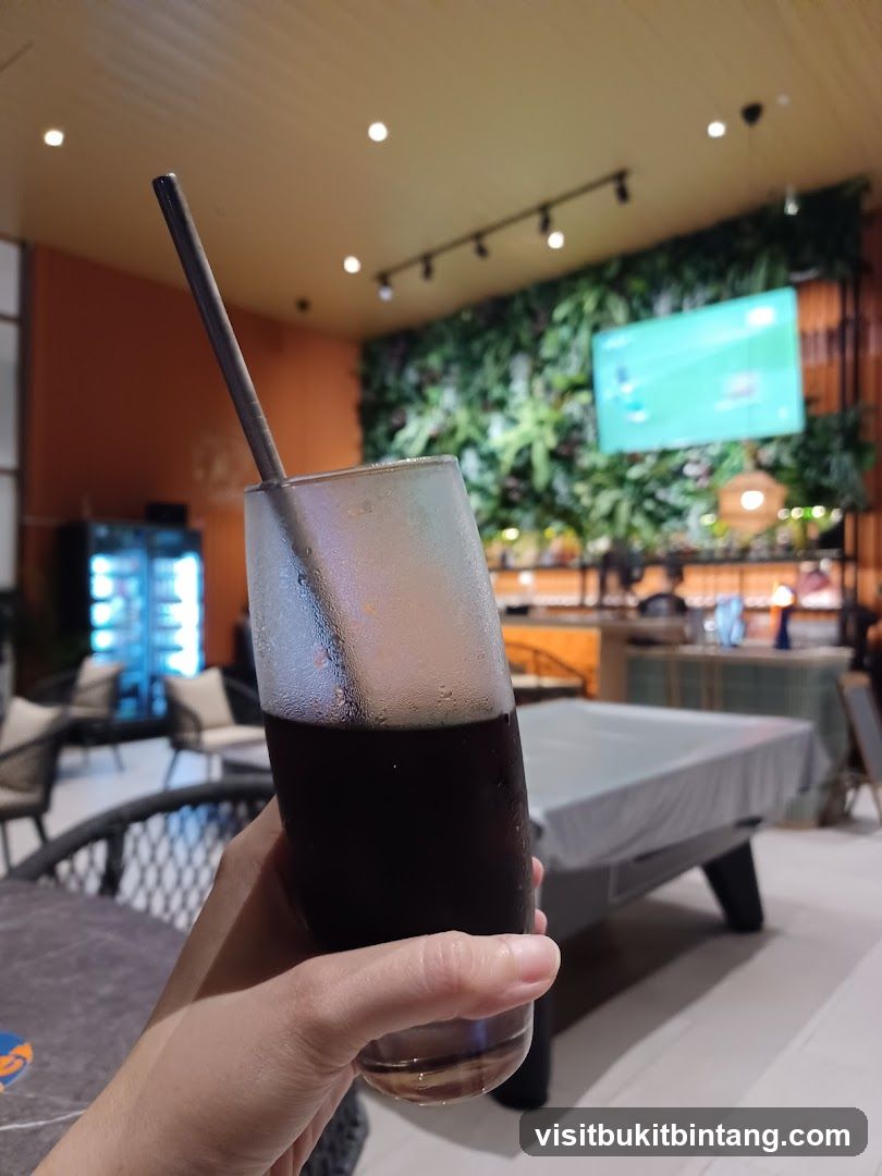 Drink in a glass with a straw