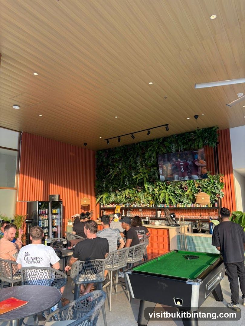Bar with Pool Table and Green Wall
